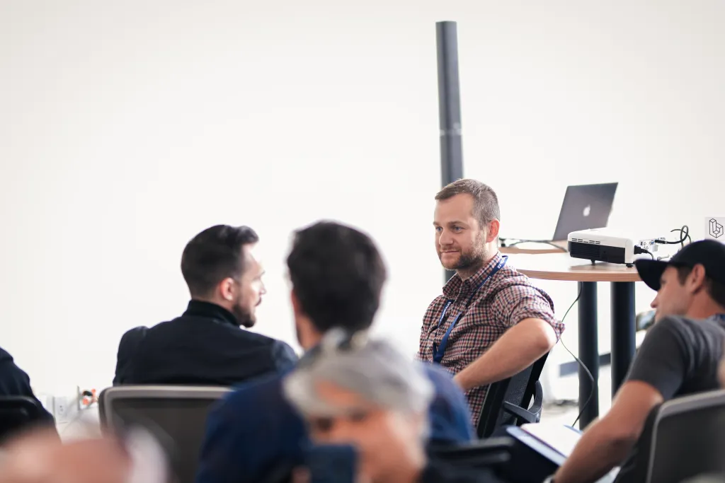 Attendee speaking with mentors at Desert Dev Lab 2025