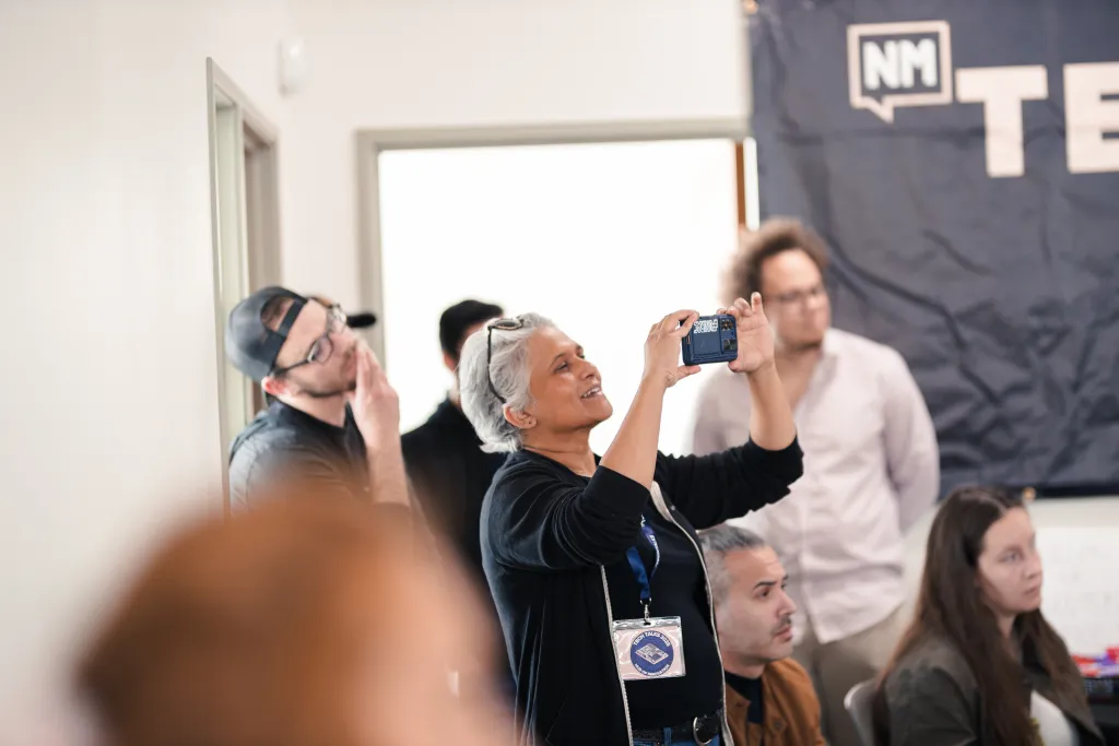 Attendee taking a photo during Desert Dev Lab 2025