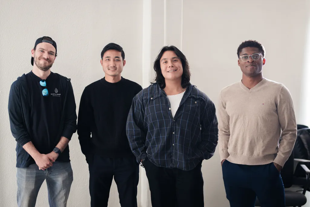 Four teammates posing together at Desert Dev Lab 2025