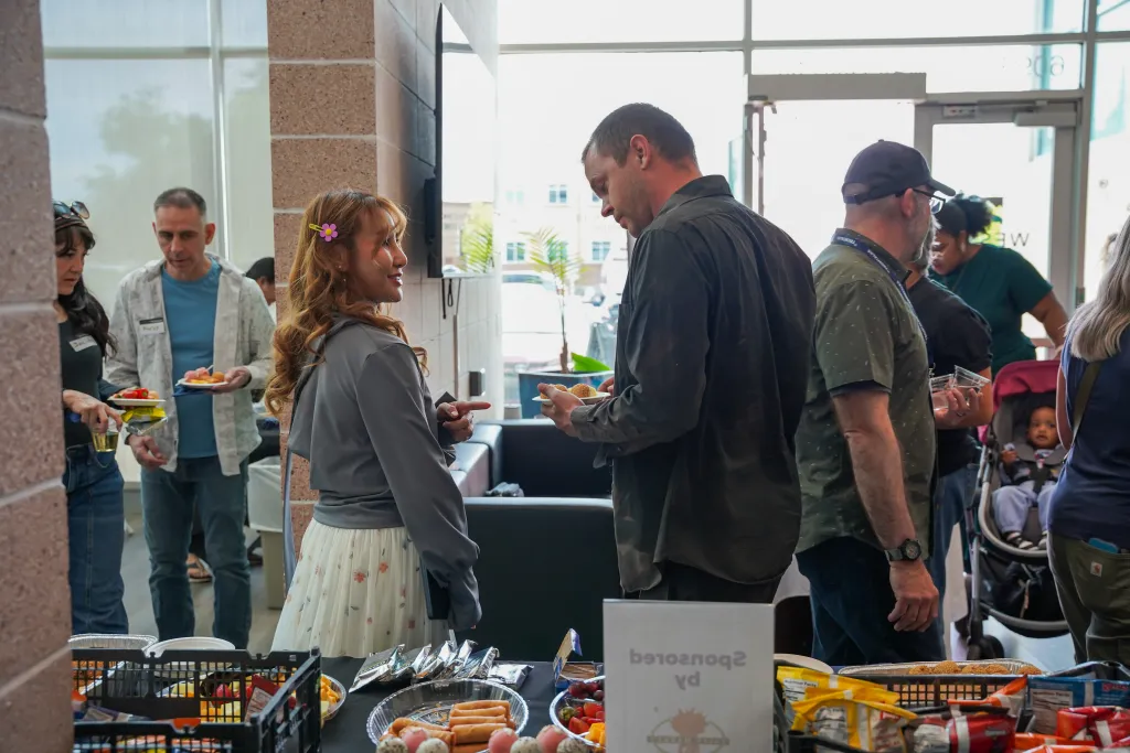 Attendees chatting and networking at Desert Dev Lab 2026