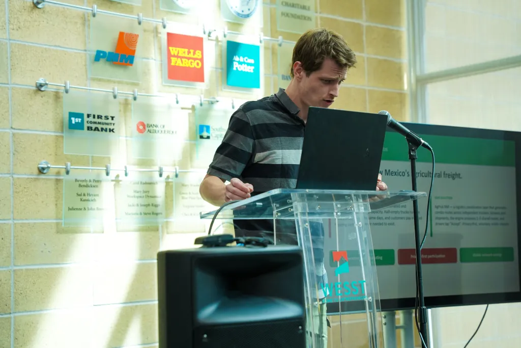 Speaker presenting from the podium at Desert Dev Lab 2026