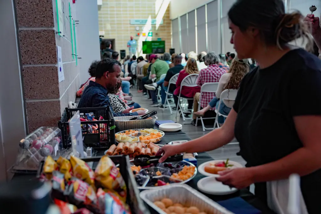 Attendees serving themselves food at the snack table at Desert Dev Lab 2026