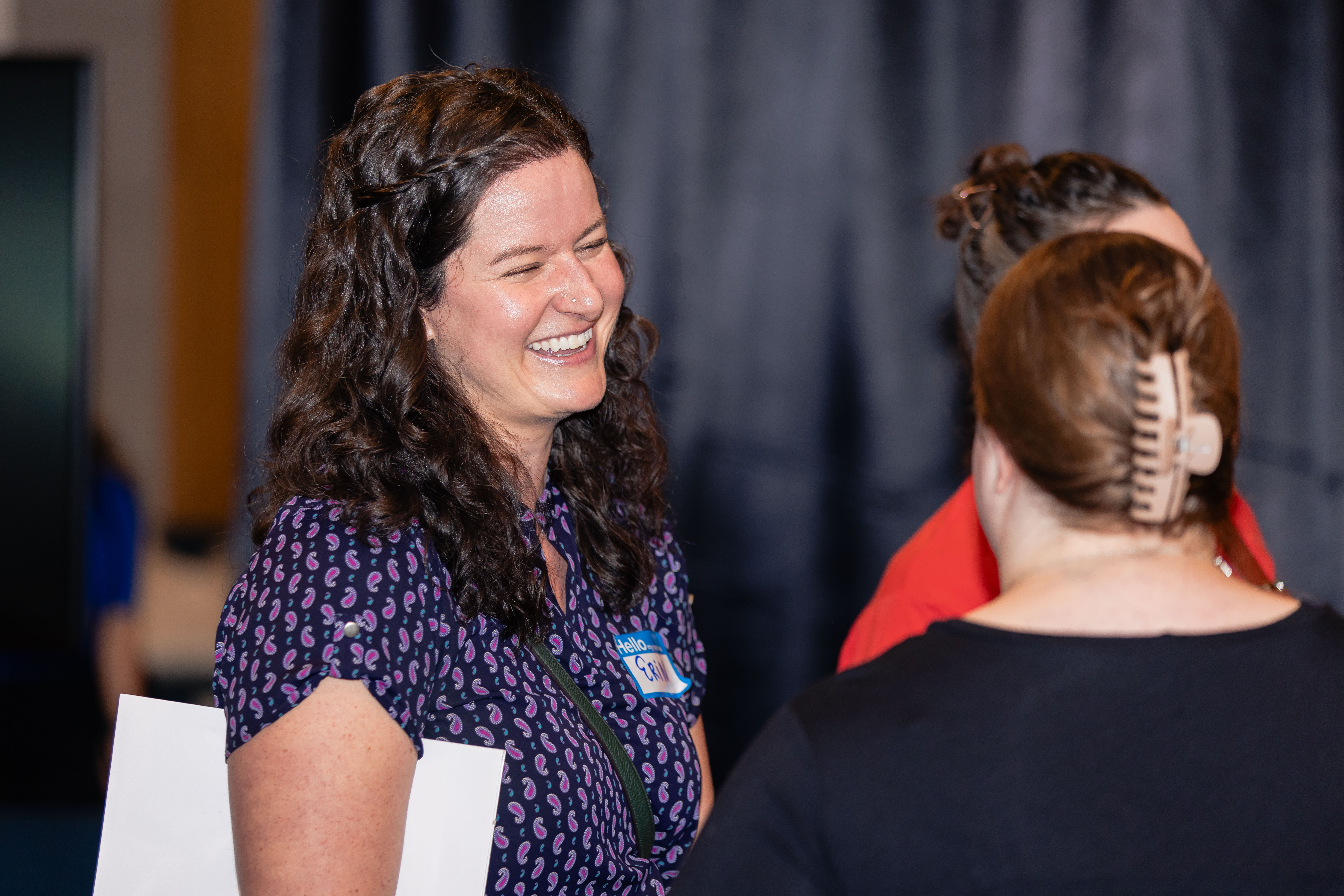 Friendly conversation between attendees at TechFest 2024